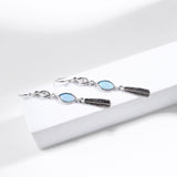 Opulent Mystique Quill Gaze Silver Earrings