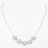Radiant Row of Flowers Silver Necklace
