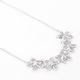 Radiant Row of Flowers Silver Necklace