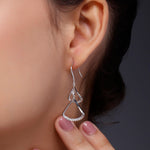 Radiant Rhodium-Plated Crystal Triangle Drop Earrings - Diavo Jewels