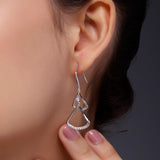 Radiant Rhodium-Plated Crystal Triangle Drop Earrings - Diavo Jewels