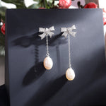 Shimmering Bow Sterling Silver Earrings - Diavo Jewels