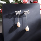 Shimmering Bow Sterling Silver Earrings - Diavo Jewels